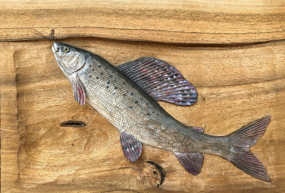 15. Grayling carved from walnut