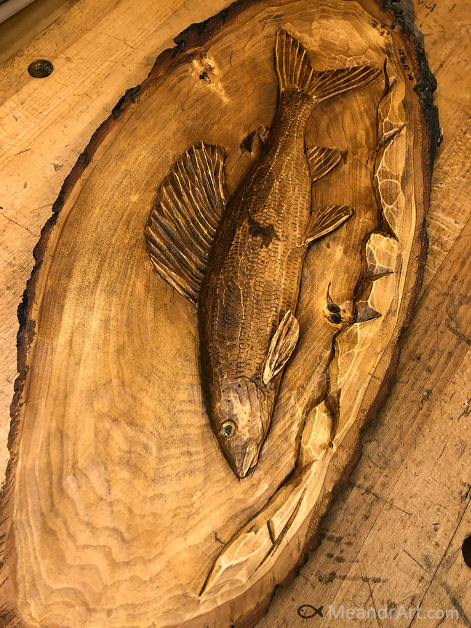 17. Grayling carved to linden slice