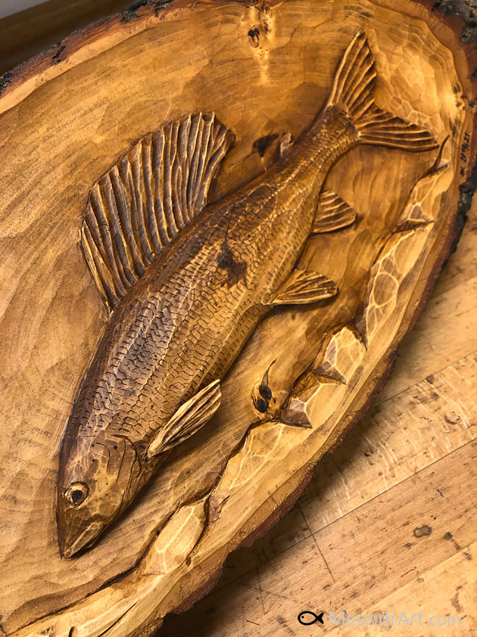 17. Grayling carved to linden slice